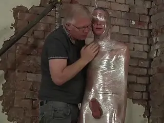 Submissive twink tied up and restrained for blowjobs and handjobs