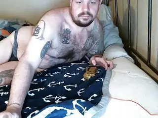 Chubby bear strokes his thick cock for the webcam
