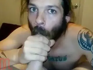 Bearded bitch gives his man an incredible blowjob