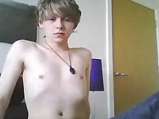 Blond twik jerks off his big dick in front of the camera 
