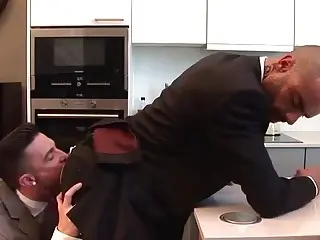 Two hung office colleagues fuck in the staff kitchen  
