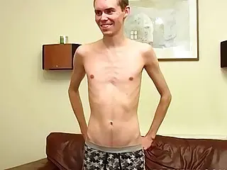 Slim twink plays with big cock solo